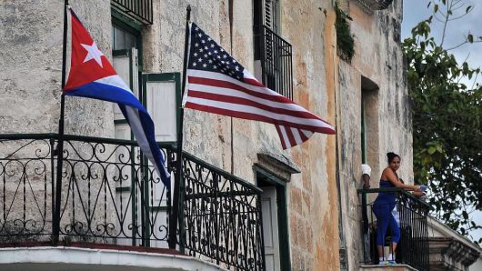 Cuban & US flags seen on a Cuban Street Pic AFP