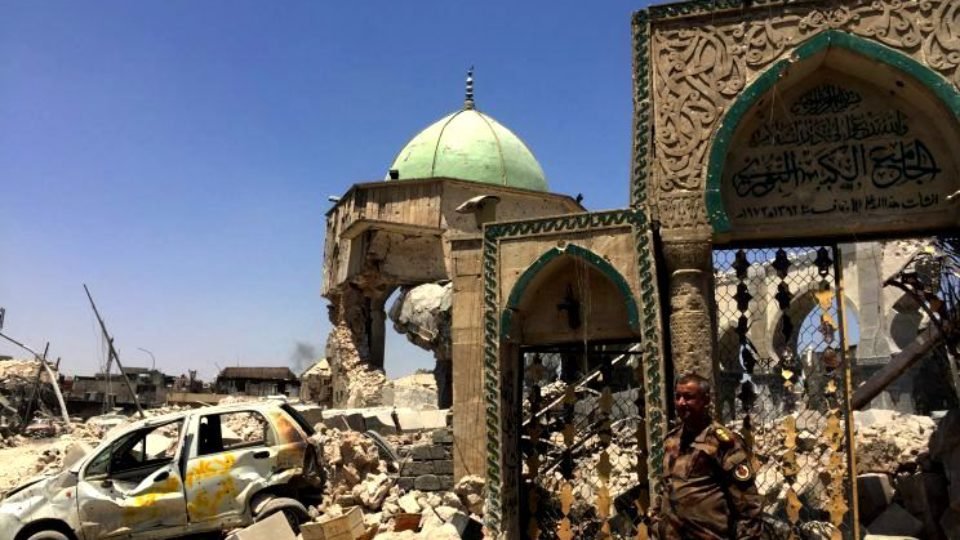 A Iraqi soldier seen outside the remains of Grand Masjid Al-Nuri Pic by Yahoo