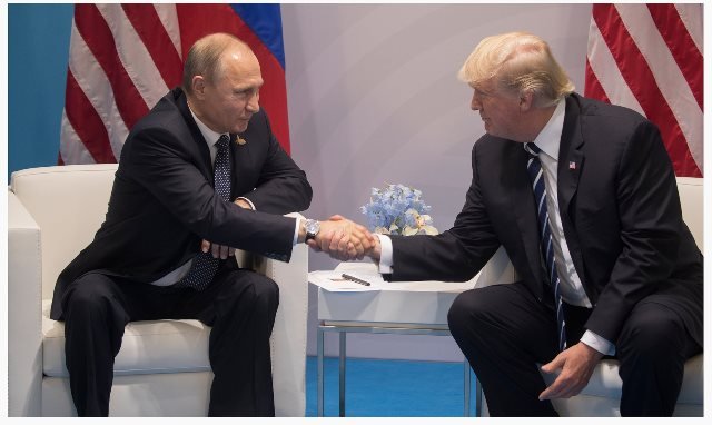 Russian President Putin on left meets US President Trump
