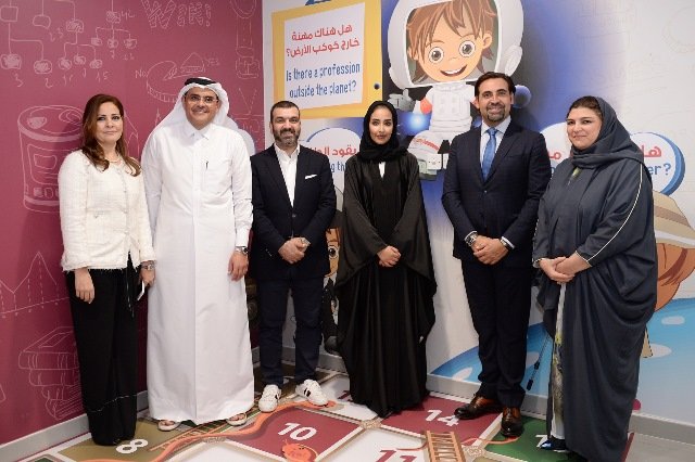 Abdulla Al-Mansoori seen with QCDC and Aura Entertainment Officials