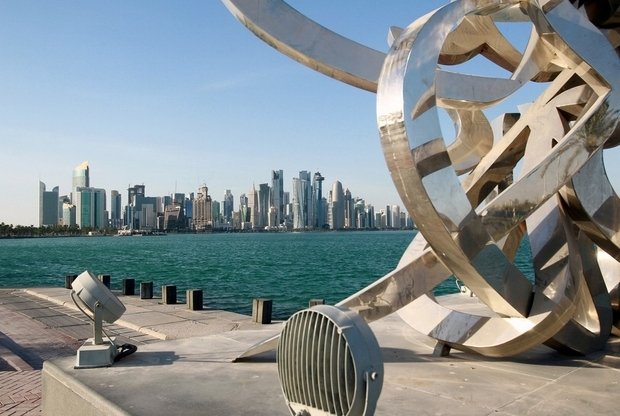 FILE PHOTO: Buildings are seen from across the water in Doha