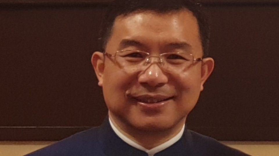 H. E. Zhou Jian